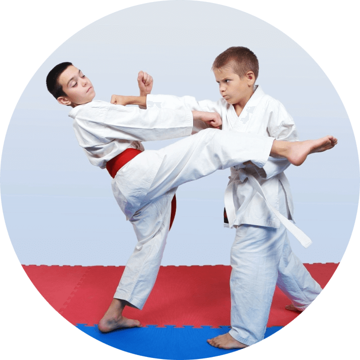 Pa Son Martial Arts and Fitness Two young men are practicing martial arts in a circle.